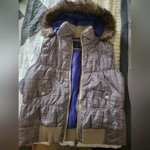 Fur-lined hooded puffer vest